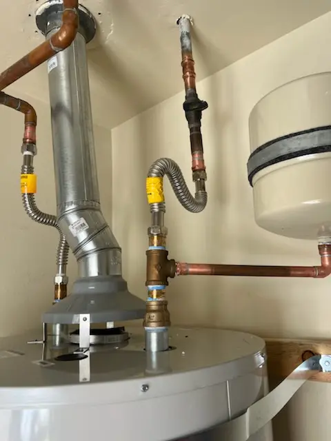 Water heater installation and plumbing repair in Braddock